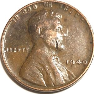 1940 P Lincoln Wheat Penny with L on rim and completely thru die break.